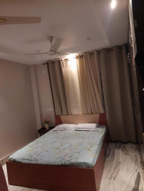 Riverside Palm 1BHK with AC and Terrace Access near Kamakhya temple